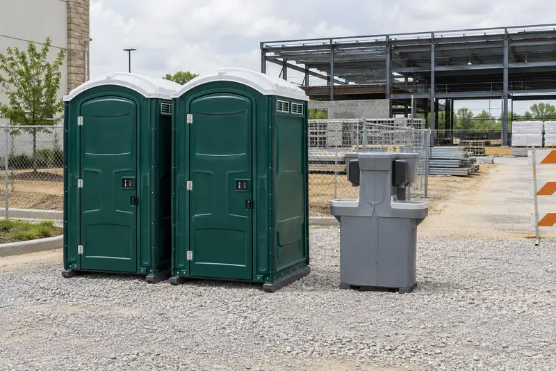 Portable toilets and washing facilities at a construction setting