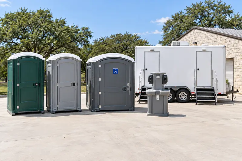 Illustrative standard and accessible cabins, handwashing and a restroom trailer